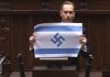 ”Israelul este noul al III-lea Reich”, apreciază în Parlamentul polonez un deputat de extremă dreapta şi agită un steag israelian cu o svastică în locul stelei lui David. Konrad Berkowicz de la Partidului Konfederacja acuză Israelul de ”genocid” în Război