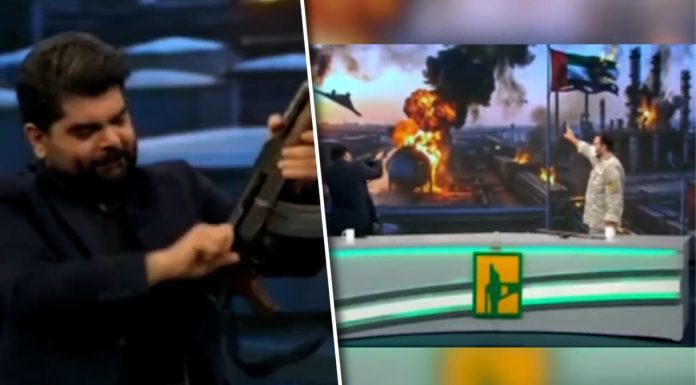 La o emisiune în direct de la televiziunea de stat iraniană, un prezentator a tras cu AK-47 într-un drapel al Emiratelor Arabe Unite