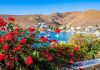 Insula romantică a Greciei pe care mulți o compară cu Santorini. Liniștea și peisajele te cuceresc instant