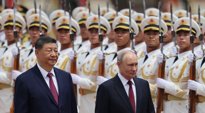 Xi Jinping, avertisment voalat la adresa lui Trump, chiar când Vladimir Putin era în vizită la el