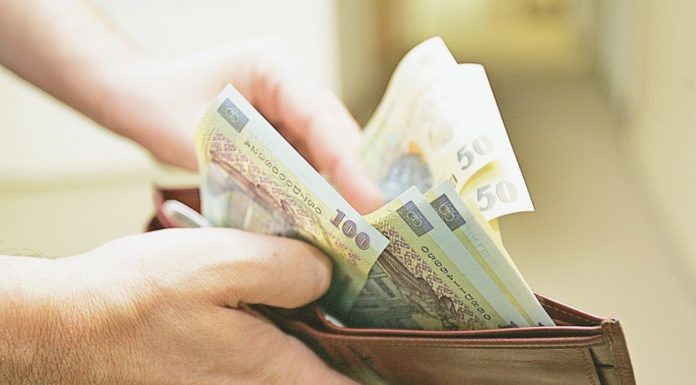 Cu cât vor crește salariile românilor în 2026. Puterea de cumpărare va rămâne pe minus, avertizează CNSP