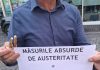 FOTO Revoltă în Ministerul Proiectelor Europene. Protest cu covrigi și pancarte al angajaților