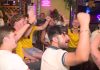 Prima victorie a României cu Hagi pe bancă, sărbătorită în Centrul Vechi: Suporterii români și galezi au petrecut împreună